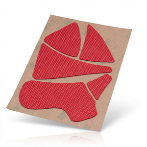 Red textured patches on a cardboard backing