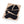 Black adhesive patches on a beige backing with a white background