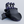 Black and purple Cyborg device on a light gray background