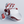 Red and white Cyborg device on a light gray background